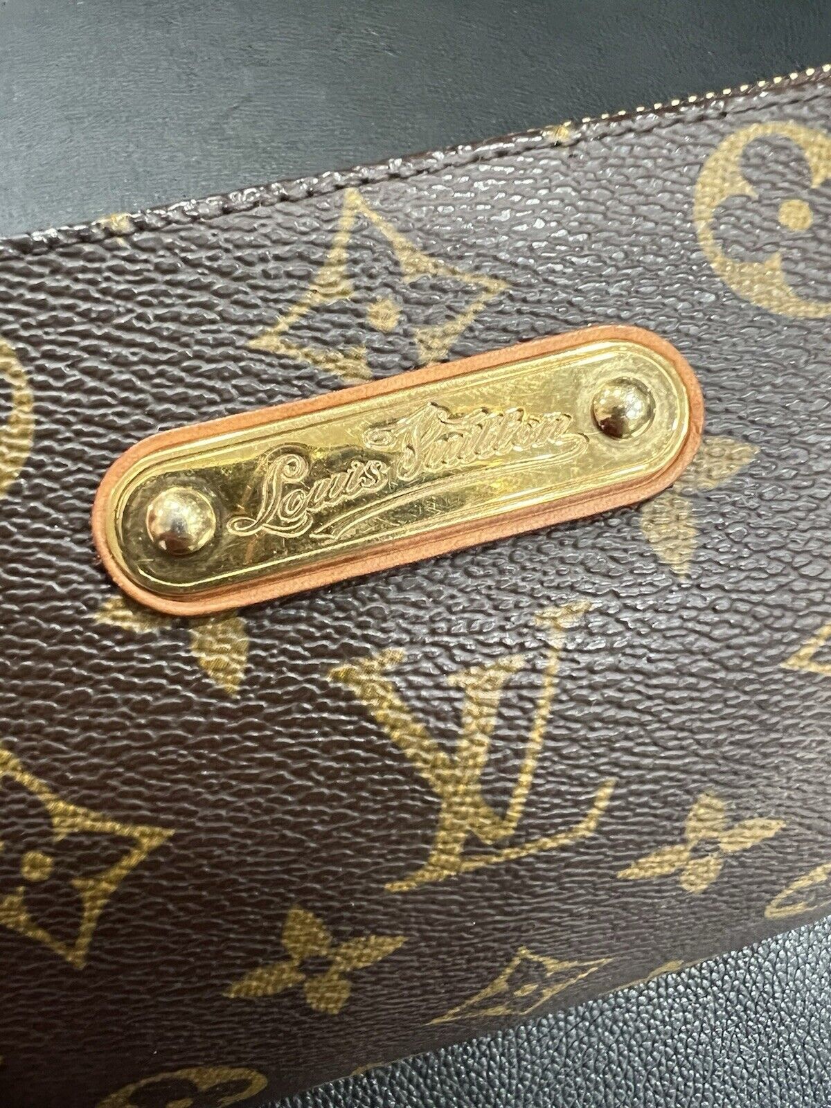 Louis Vuitton Monogram Eva Clutch Bag W/Certificate (Current Retail $1850)