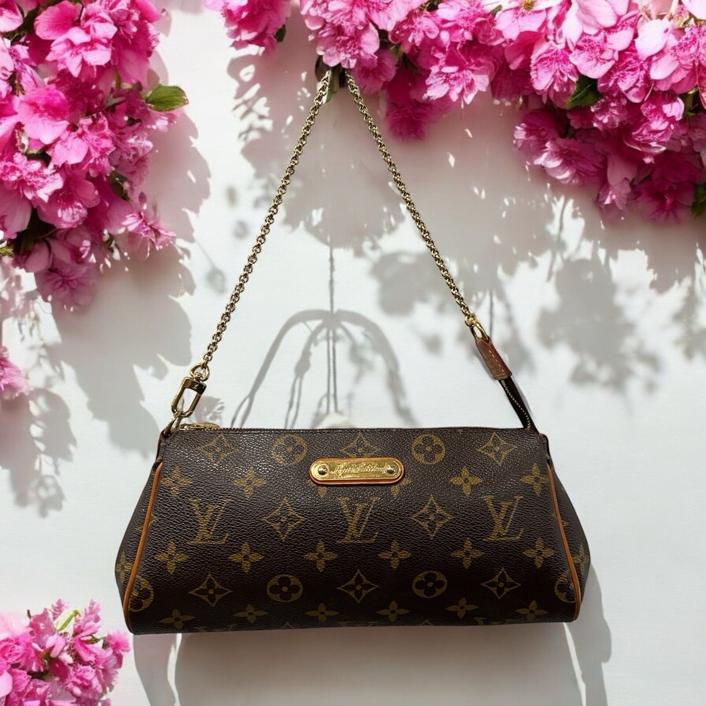 Louis Vuitton Monogram Eva Clutch Bag W/Certificate (Current Retail $1850)
