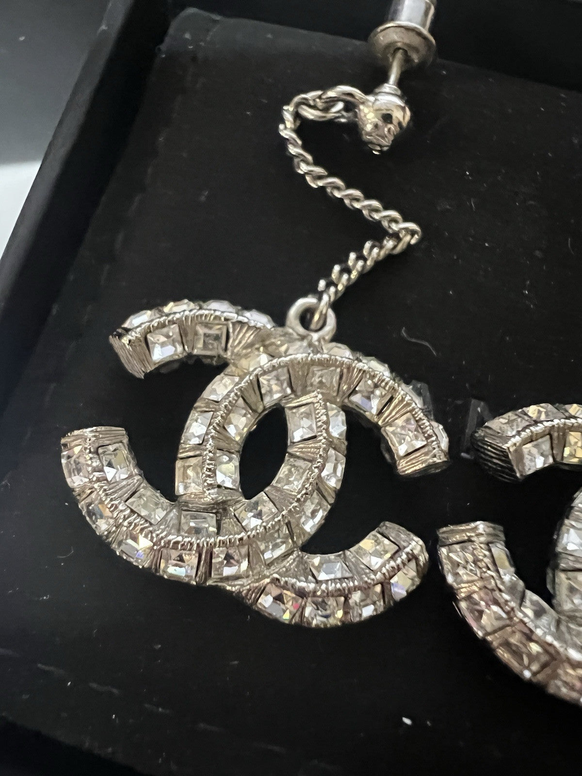 Chanel Silver Toned Crystal Drop Baguette Logo Earrings AUTHENTIC