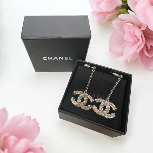 Chanel Silver Toned Crystal Drop Baguette Logo Earrings AUTHENTIC