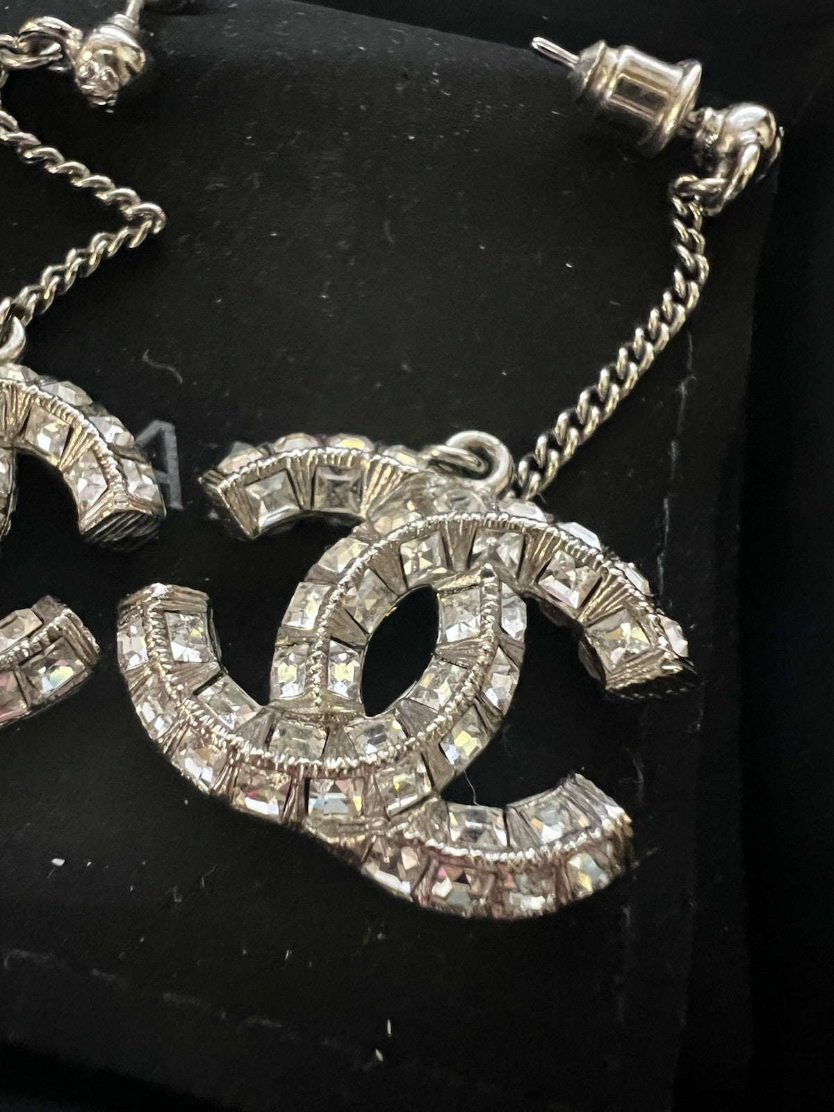 Chanel Silver Toned Crystal Drop Baguette Logo Earrings AUTHENTIC